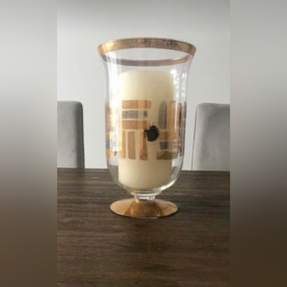 Glamorous Italian Glass/Gold; vase, candle holder
 
H: 11.5 “
W: 7”